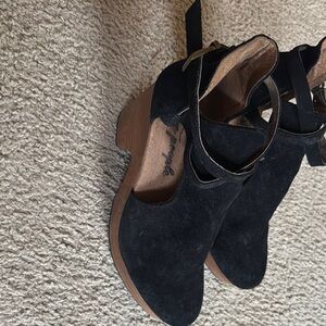 Free People Black Suede Wedges Used! 
Shoe pad removed, but some still there.